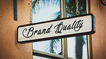 Street Sign the Direction Way to BRAND QUALITYの写真素材
