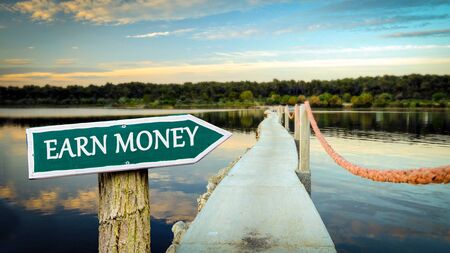 Street Sign the Direction Way to Earn Moneyの写真素材
