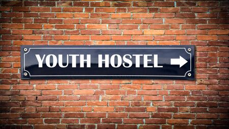 Street Sign the Direction Way to Youth Hostelの写真素材