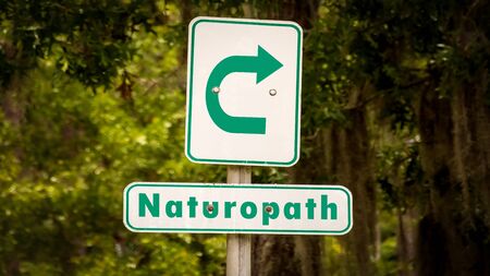 Street Sign the Direction Way to Naturopathの写真素材
