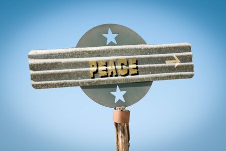 Street Sign the Direction Way to Peaceの写真素材