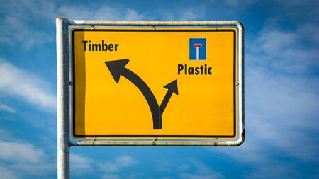 Street Sign the Direction Way to Timber versus Plasticの写真素材