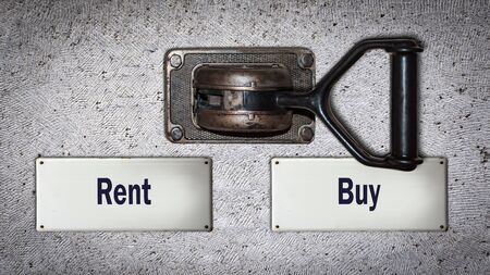 Wall Switch the Direction Way to Buy versus Rentの写真素材