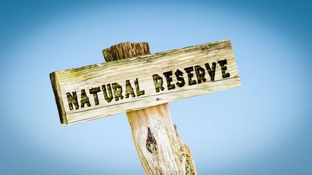 Street Sign the Direction Way to NATURAL RESERVEの写真素材