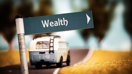 Street Sign theDirection Way to Wealthの写真素材