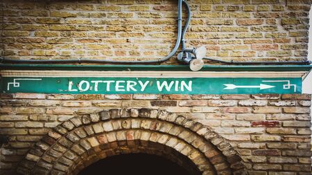 Street Sign the Direction Way to Lottery Winの写真素材