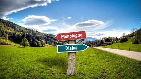 Street Sign the Direction Way to Dialog versus Monologueの写真素材