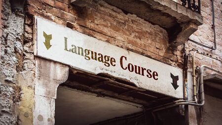Street Sign the Direction Way to LANGUAGE COURSEの写真素材
