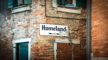 Street Sign the Direction Way to Homelandの写真素材