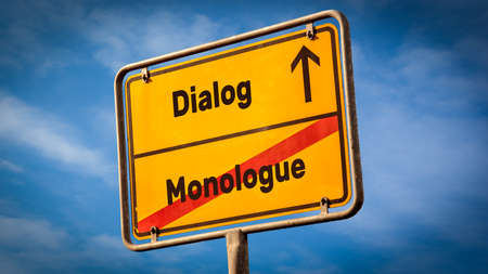 Street Sign the Direction Way to Dialog versus Monologueの写真素材