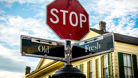 Street Sign the Direction Way to Fresh versus Oldの写真素材