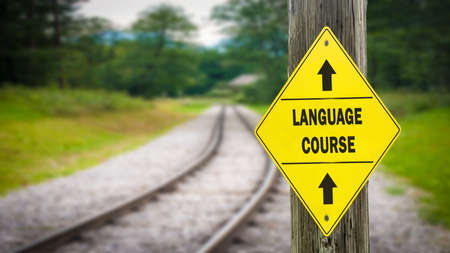 Street Sign the Direction Way to LANGUAGE COURSEの写真素材