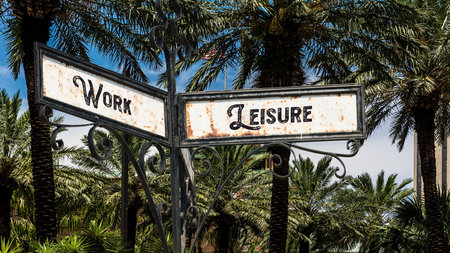 Street Sign the Direction Way to Leisure versus Workの写真素材
