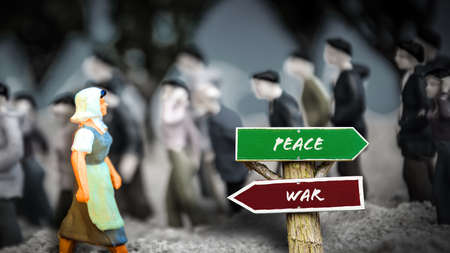 Street Sign the Direction Way to Peace versus Warの写真素材