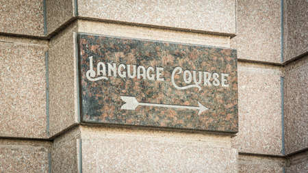 Street Sign the Direction Way to LANGUAGE COURSEの写真素材
