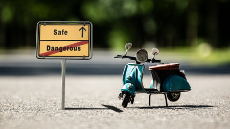 Street Sign the Direction Way to Safe versus Dangerousの写真素材