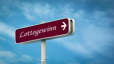 a picture with a sign post in the direction of winning the lottery in germanの写真素材