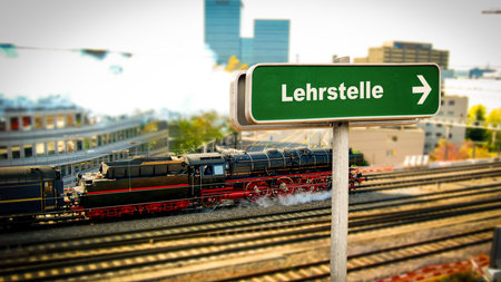 A picture with signposts in the direction of the apprenticeship position in Germanの写真素材