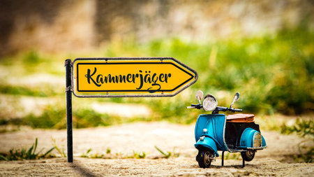 The picture shows a signpost and a sign that points in German in the direction.の写真素材