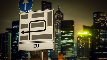 the picture shows a sign post and a sign pointing in the direction of the eu in german.の写真素材