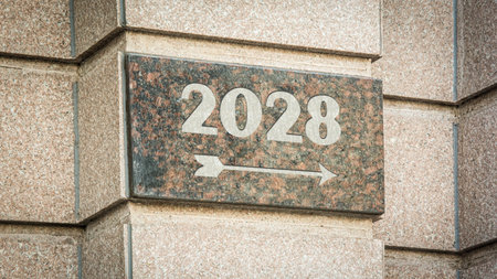 Image of a signpost pointing in the direction of the year 2028の写真素材