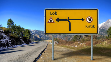 An image with a signpost pointing in two different directions. One direction points to love, the other points to hate.の写真素材