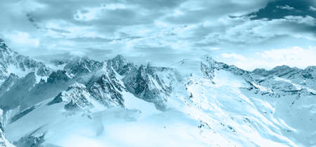 mountains in the snow, snow covered mountainsの写真素材