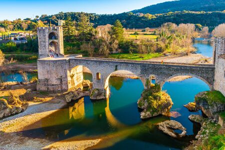 Besalu medieval fortified bridge in Catalonia, Spainの写真素材