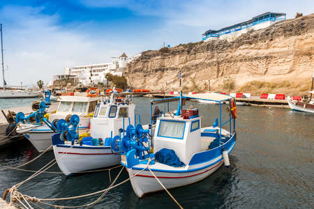 Fishing boats on the island of Santorini in the Cyclades in Greeceの写真素材