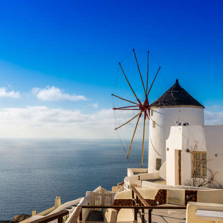 typical mill of Oia on the island of Santorini in the Cyclades in Greeceの写真素材