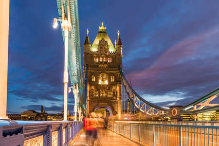Tower Bridge on Thames river at night in London, UKの写真素材
