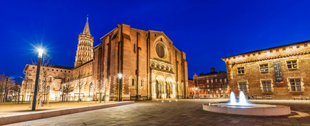 The Basilica of Saint Sernin illuminated at night, in Toulouse in Occitanie, Franceのeditorial素材