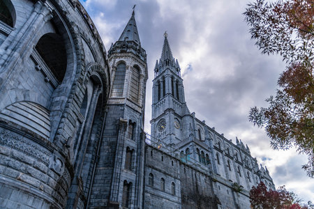 The Basilica of Our Lady of the Rosary is a Romanesque-Byzantine Catholic basilica located in Lourdes, Occitanie, France.の写真素材