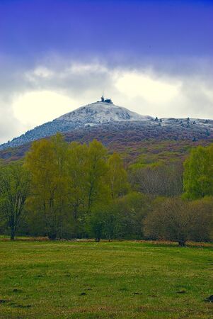 view of Puy de Dome, Auvergne volcano, snow-covered at the top