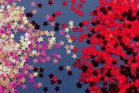 background consisting of small bright stars on blue paper background. For Christmas and New Yearの写真素材