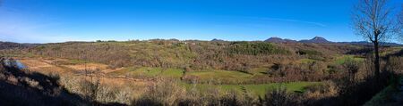 panoramic view of Puy-de-Dome and Puy-de-Come in Auvergne. View from Saint-Pierre-le-Chastelの写真素材