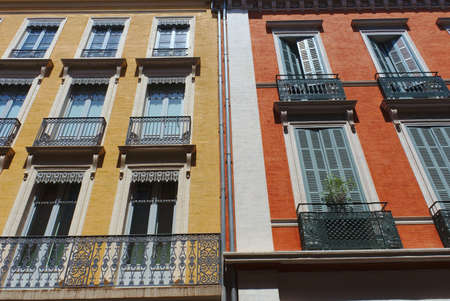 Toulouse, facades of houses in the city center, in local colors, yellow and orangeの写真素材