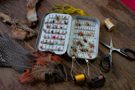 fishing fly storage box and tying materialsの写真素材
