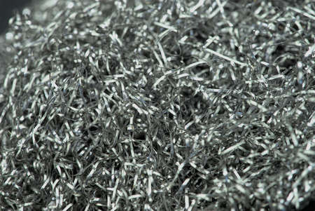 background of steel tangled metal fibers, close-up macro photographyの写真素材