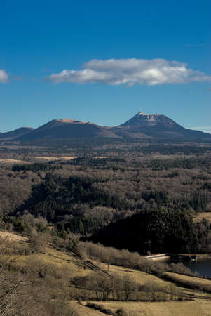 view of the Puy-de-Dome and the Puy-de-Come, massif of the volcanoes of Auvergneの写真素材