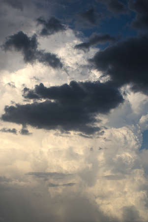 background of light and dark clouds on blue sky, backgroundの写真素材