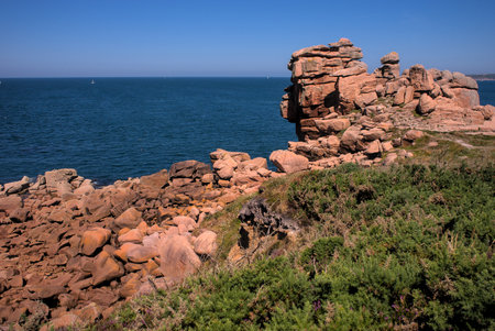 Monolithic blocks of pink granite in the Cotes d'Armor in Brittany, France. pink granite coastの写真素材