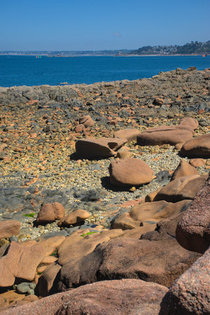 Monolithic blocks of pink granite in the Cotes d'Armor in Brittany, France. pink granite coastの写真素材