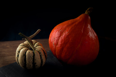 Still life with autumn vegetables, orange pumpkin and patidouの写真素材