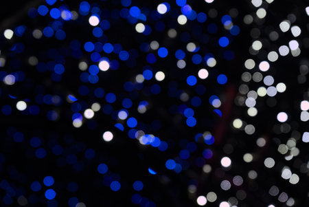 blue and white light bubbles, abstract background, bokeh blur effectの写真素材