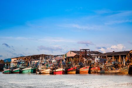 Thai Fishing Boats docked at the port of Ranong province, Thailand.の写真素材