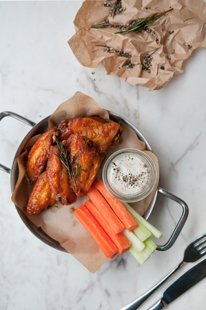Deep fried chicken wings with special mayo dip.の写真素材