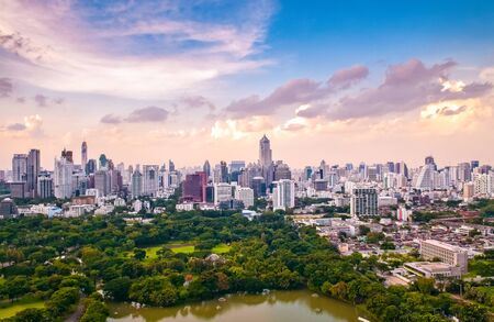 Bangkok's street with big trees.の写真素材