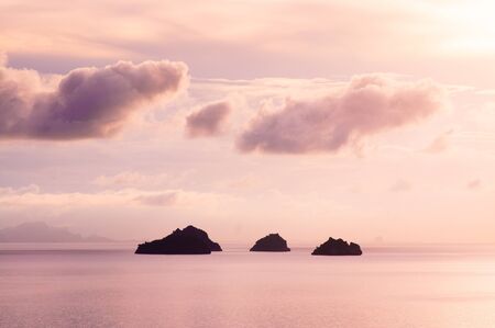 Rose Sunset sky with small islands near Samui island, Thailandの写真素材