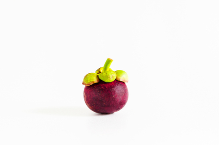 Isolated whole Mangosteen on white background.の写真素材